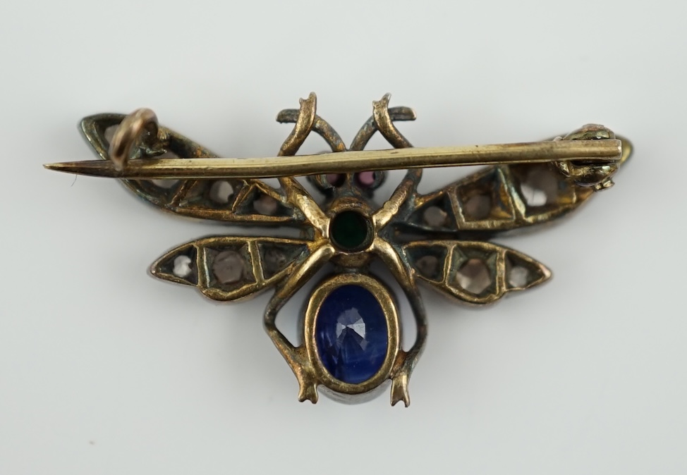 A Victorian gold and silver, emerald, diamond and sapphire cluster set bug brooch